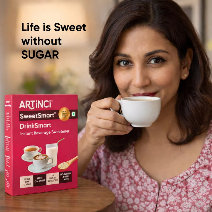 Woman drinking coffee with an ArtiNci SweetSmart product box next to her.